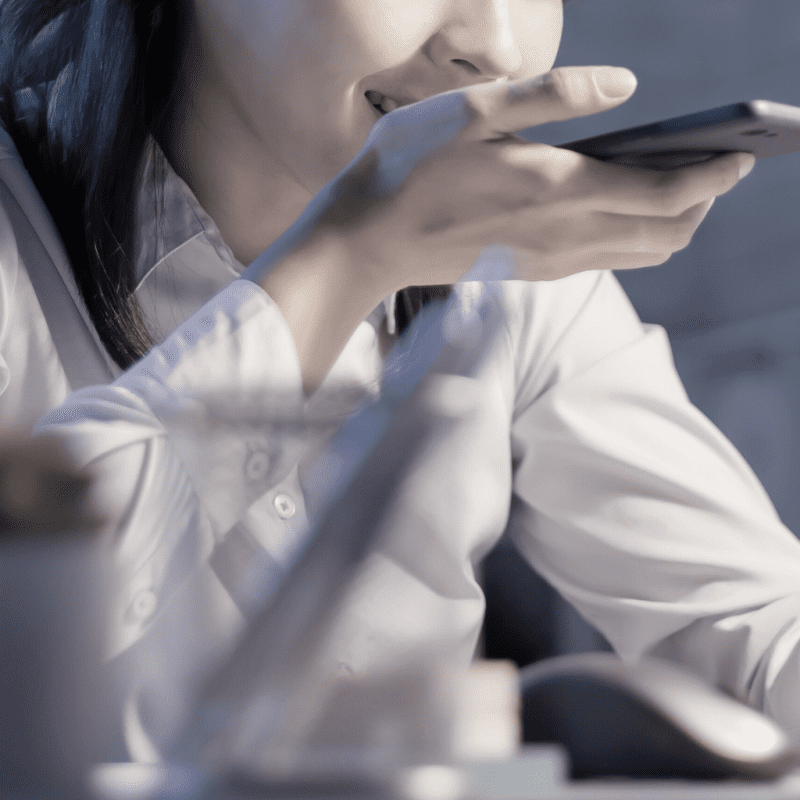 woman talks into mobile phone