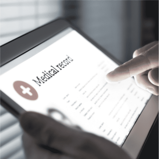 closeup of a doctor interacting with a digital medical record